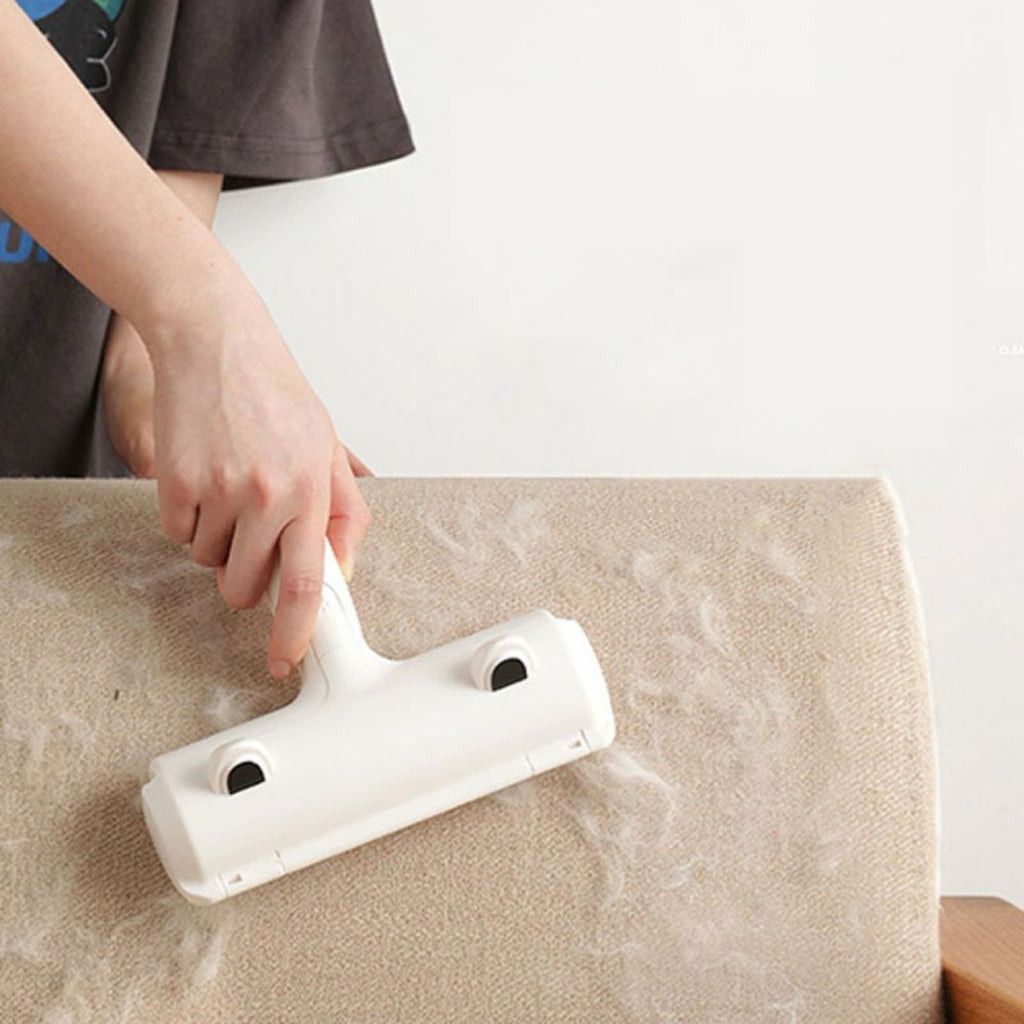 Hair remover roller cleaning a couch