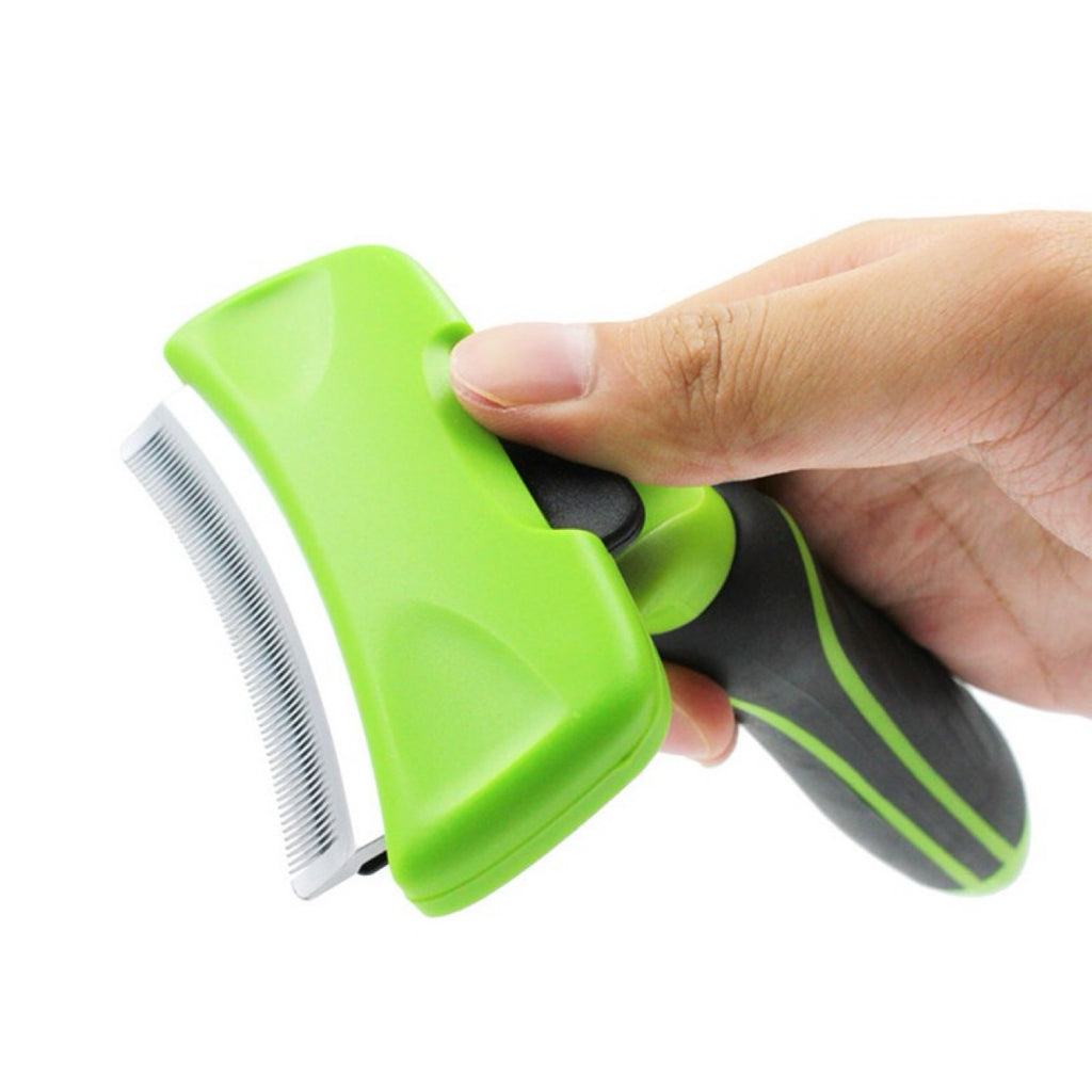 Deshedding brush - one-button fur ejector in hand